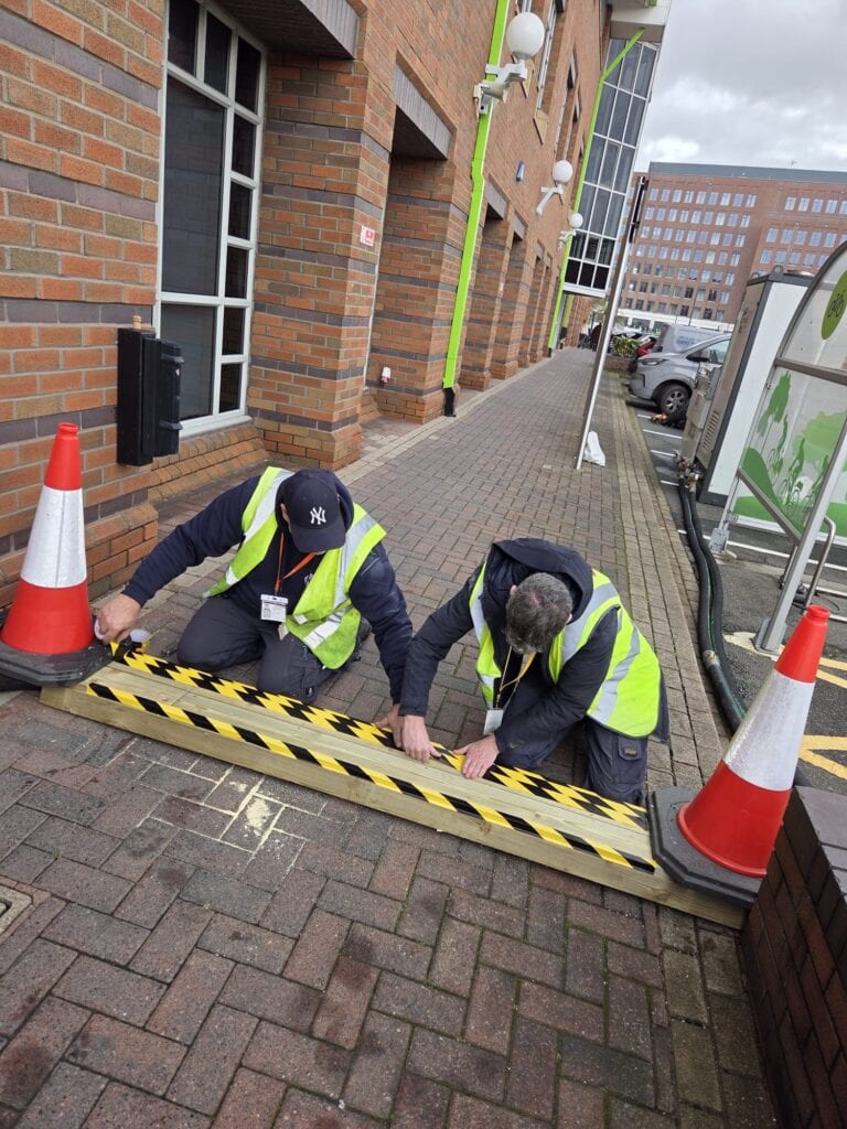Supermarket heating hire setup by Celsius Hire engineers covering wires in a public sidewalk