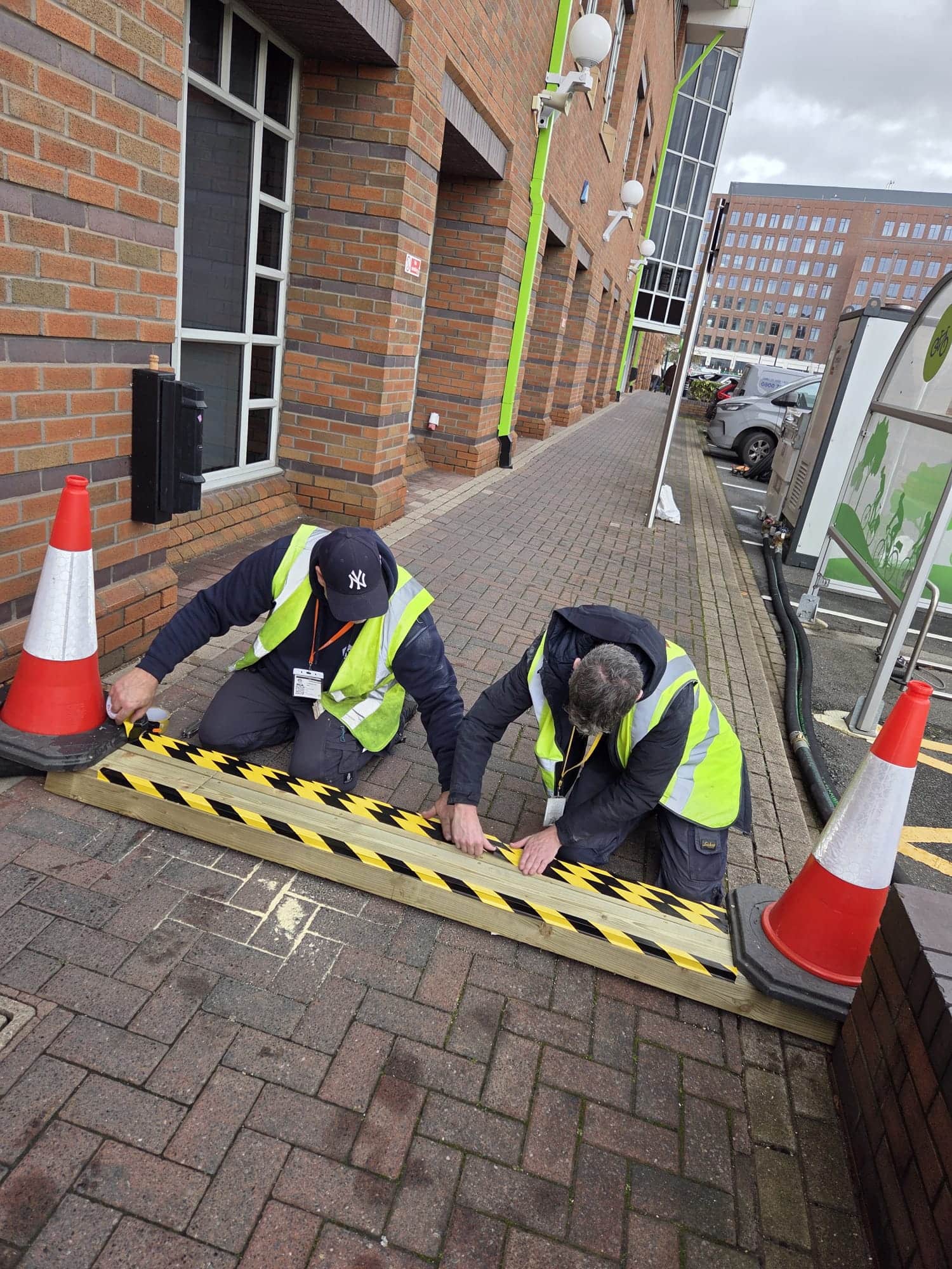 Supermarket heating hire setup by Celsius Hire engineers covering wires in a public sidewalk