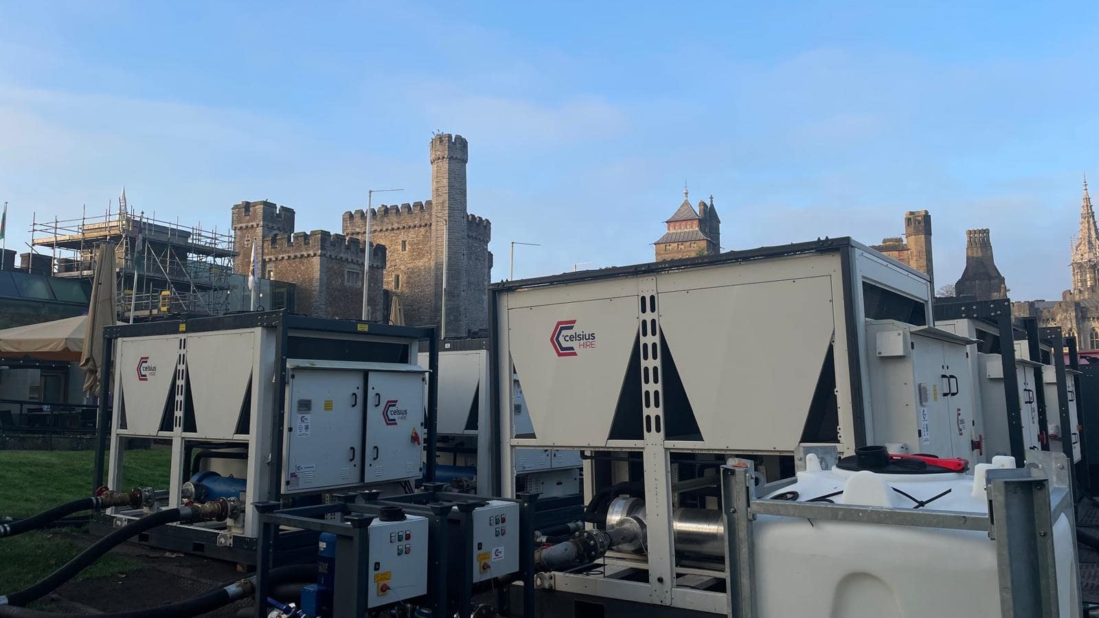 Cardiff ice rink chiller supplied by Celsius Hire. Cooling solution in the centre with Cardiff castle in the background on a sunny day