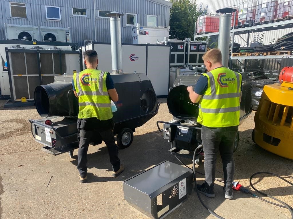 2 engineers working on Indirect Fired Heaters in Celsius Hire yard