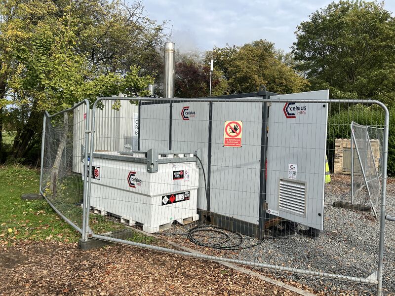 Biomass District Heating application surrounded by trees